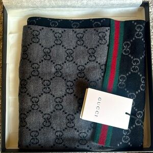 Gucci black/grey monogram print w/stripe.